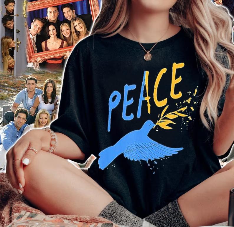 Flying Bird Symbol Of Peace Support Ukraine Flag No War Peace Ukraine T-Shirt woman shirt